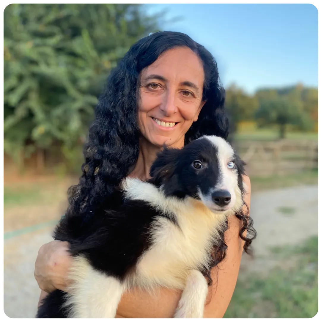 Alessandra Calissano con un cucciolo di border collie